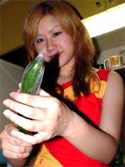 Asian teen puts carrot n cucumber in pussy