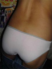 Asian teen shows her white panties and pussy