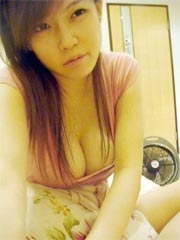 Selfmade photos of busty Asian babe at home
