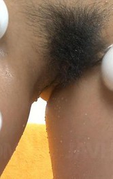 Hairy Asian chick made to cum with several vibrating toys